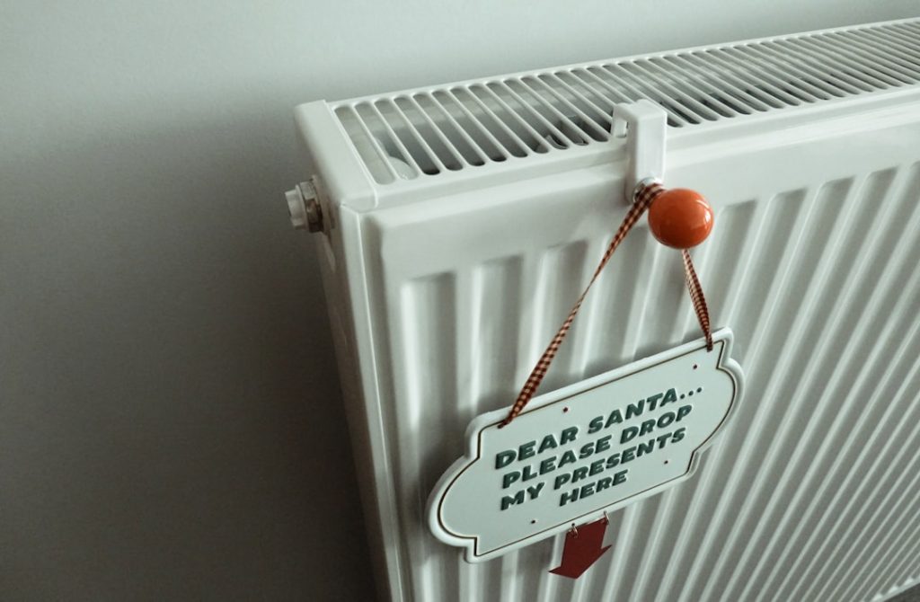 a-radiator-with-a-sign-attached-to-it-d9gu6kir3ly