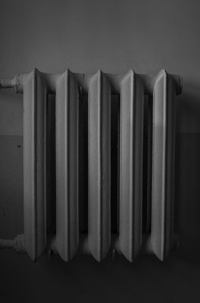 white-radiator-heater-on-white-wall-hu6xl7ljxh4